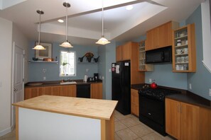 Fully equipped kitchen with plenty of space for preparing for 16.