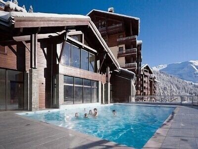 5 * Ski-in Ski-out Wohnung mit Pool, Jacuzzi, Sauna, Fitnessraum und Wifi