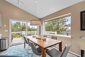 Dining Area - Plenty of space at the 8-person wooden table