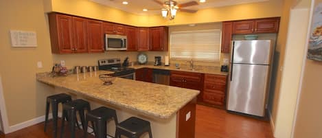 Fully Equipped and Updated Kitchen with Granite Counter Tops/Stainless Steel Appliances-Perfect for Meals Large and Small