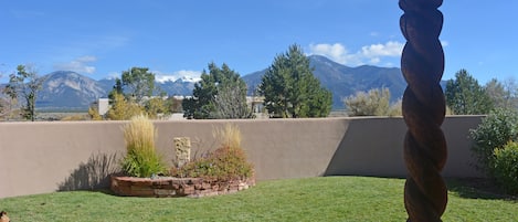 Adobe wall enclosed yard for seclusion and privacy all with mountain views