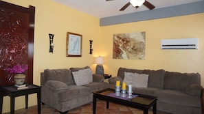 Living Room Area with Couch and Love Seat
