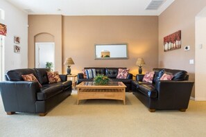 Spacious living room perfect for gathering with family and friends.