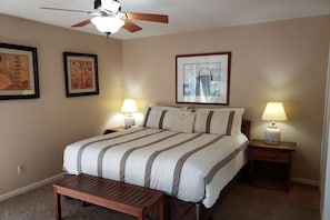 Master Bedroom with King-Size Bed, and Ceiling Fan.