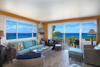 Enjoy stunning ocean and mountain views from this lovely end-unit condo.