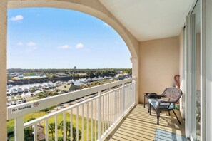 Private balcony w/comfortable seating, overlooking the marina