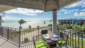 Enjoy an oceanfront meal at the dining table on the balcony...