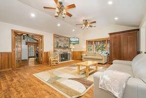 Living Room - Spacious living room complete with couches and chairs. Ideal for groups.