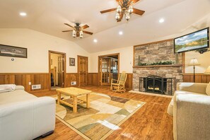 Living Room - Spacious living room complete with couches and chairs. Ideal for groups.