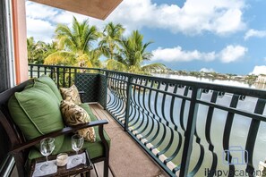 Enjoy your morning coffee or an evening beverage on your master bedroom private balcony with incredible bay views.