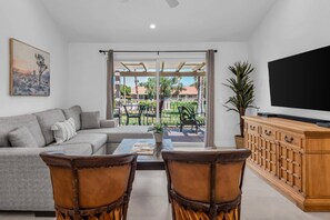 Family room with large surround sound TV