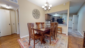 Dining area with seating for 6 plus kitchen bar stools.