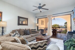 The plush sofas'ed living room.