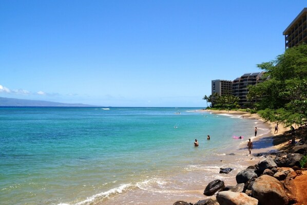 'S' turns beach is directly across the street from the Kahana Villa complex.