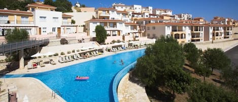 Penthouse to the right of the pool