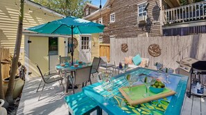 The spacious sundeck will surely be a primary gathering place for your group...
