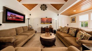 The living room is truly big enough for the whole gang, with a large flat screen TV...