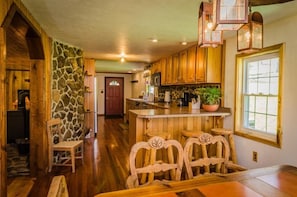 Dining Area and Kitchen - Main Level - Tables and seating for 6.