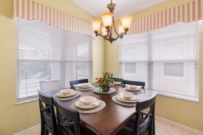Elegant dining area with seating for six, perfect for shared meals and memories.