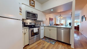 Kitchen with cooking essentials.