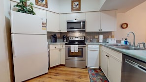 Nice size kitchen with appliances and cooking/eating necessities