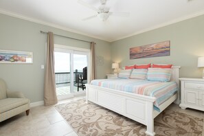 Primary master bedroom with king bed and views of the ocean. This home is an unbeatable Pet Friendly vacation home!