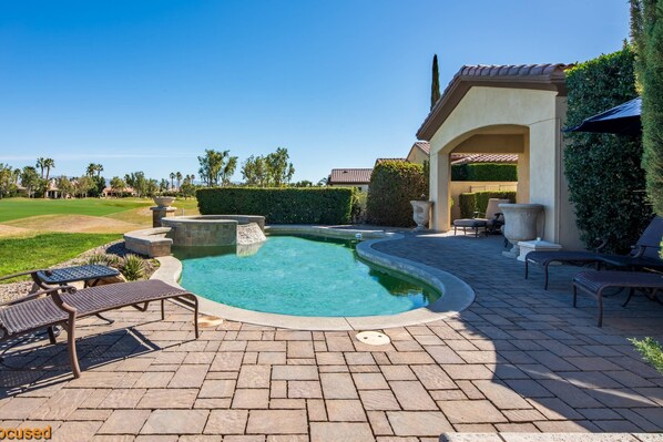 Sunbathing by the Pool -