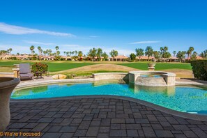 Back Patio and seating area overlooking Golf Course and Mountains Patio and seating area