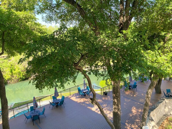 Inverness 211 balcony view of the Comal River