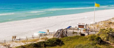 Tranquility from the patio ~ Count the layers of the Emerald Coast while becoming memorized with the soothing waves.