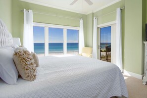 Master bedroom with king bed and balcony access overlooking Gulf and beach