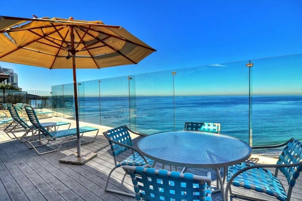 Ocean view deck in front of condo