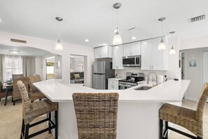 Wrap-Around Breakfast Bar for Additional Seating