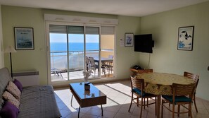 Living and dining room with a baeautiful view