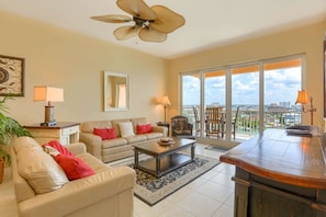 Living Room with Access to Private Balcony with Beautiful Water Views