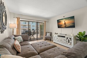 Large Sectional Sofa and Smart TV in the Living Room