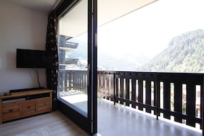 Large sliding door to wrap around balcony