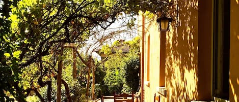 marble tables in the garden set for a relaxing al fresco lunch