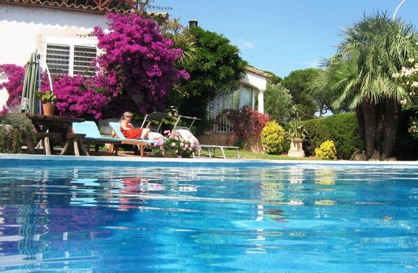 Relax by the large heated salt water pool