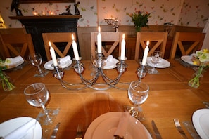 Elegant oak-panelled dining room, ideal for a celebration meal.