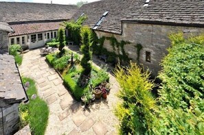 Enter via the beautiful courtyard