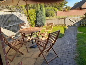 Wheat front , table in garden area