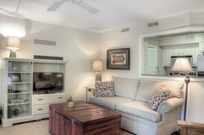 harbour-oaks-309-living-room-open-layout - Spacious living room with cozy seating and smart TV—perfect for curling up after a walk with your four-legged friend.
