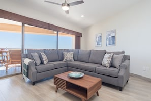 The Living room is set on the ocean side of the unit.