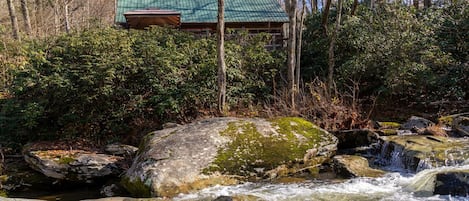 Short-range river view of the cabin