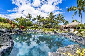Gated and heated pool that is just a short walk from villa.