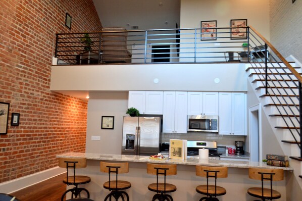 Upstairs Living room open to the kitchen 