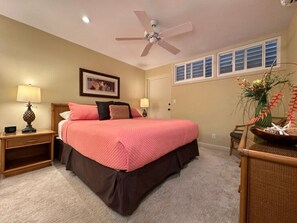 Primary Bedroom with King size bed, AC and double paned windows - Relax into this king size bed. There is a split system AC for your comfort and double paned windows for noise control.
