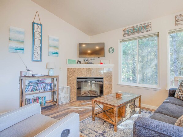 Living Area - Cozy up by the fireplace and watch a movie