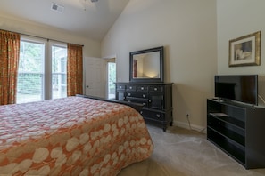 master bedroom - flat screen tv and plenty of storage space